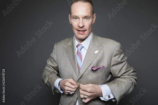 Obraz Businessman Closing Jacket