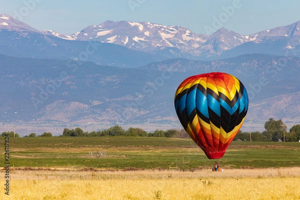 Fototapeta Hot Air Balloon with Mountain Background
