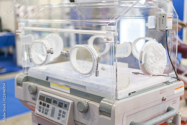 Fototapeta Empty infant incubator in an hospital room. Nursery incubator in hospital