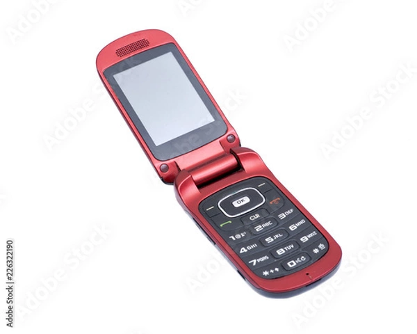 Obraz Old used flip cell phone isolated on white background