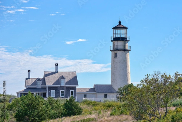 Fototapeta A light house in Cape Cod along the Cape Cod National Seashore in Massachusetts.