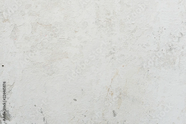 Fototapeta Wall fragment with scratches and cracks. It can be used as a background