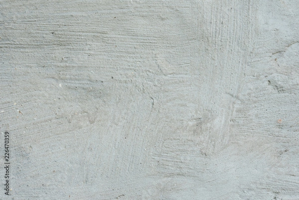 Fototapeta Wall fragment with scratches and cracks. It can be used as a background