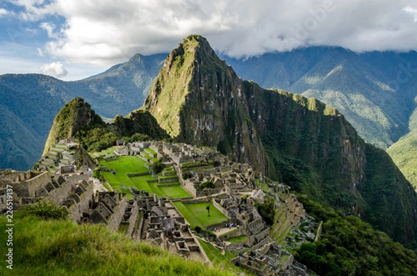 Fototapeta Classic photo of Machu Picchu with the face looking up and the citadel of the Incas, Peru