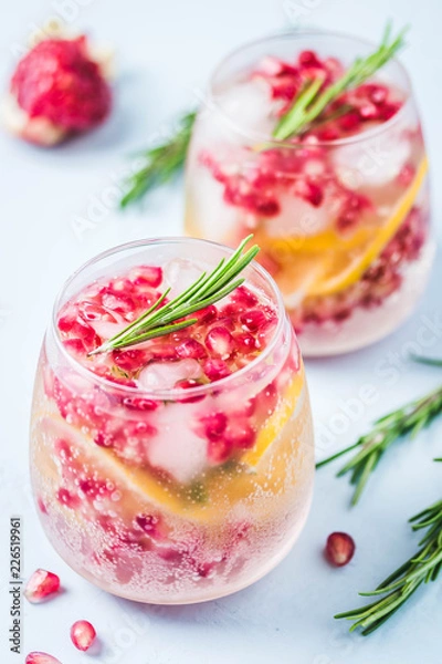 Fototapeta Festive drinks, citrus, pomegranate cocktail. Selective focus, space for text.