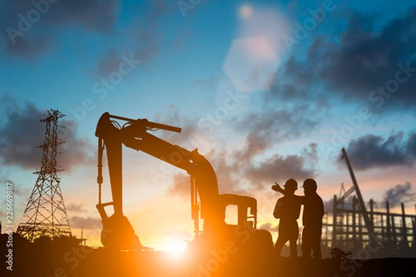 Obraz Silhouette of engineer and construction team working at site over blurred background for industry background with Light fair.Create from multiple reference images together