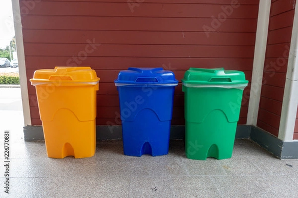 Fototapeta Recycle garbage bins or Sorted recycling bins in multiple color
