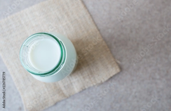 Fototapeta milk in bottle background,