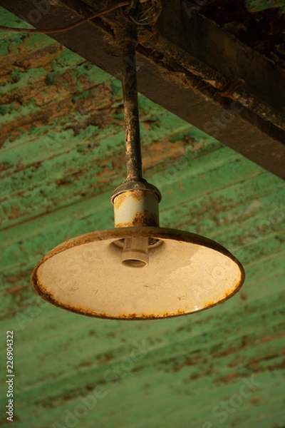 Obraz old lamp on the wall