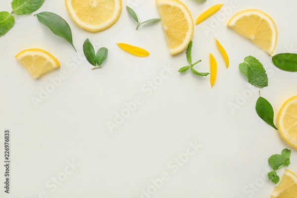 Fototapeta Flat lay composition with lemon slices on white background