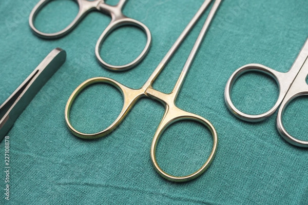 Fototapeta Several scissors for surgery in operating room of a hospital, conceptual image