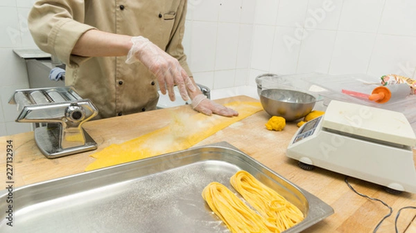 Obraz Chef cooking a pasta