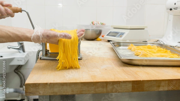 Obraz Chef cooking a pasta