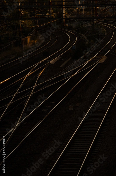 Fototapeta light on the railroad tracks