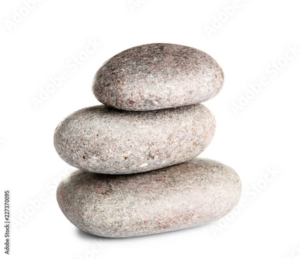 Fototapeta Stack of zen spa stones on white background