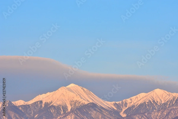 Fototapeta 朝焼けの常念岳と横通岳