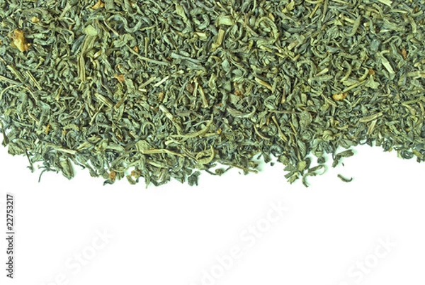 Fototapeta Scattering of green tea isolated on white