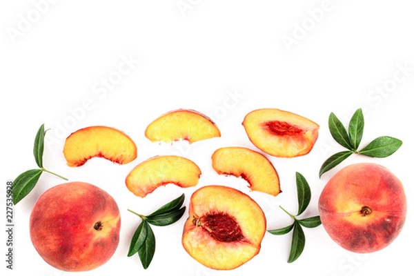 Fototapeta ripe peaches with leaves isolated on white background with copy space for your text. Top view. Flat lay pattern