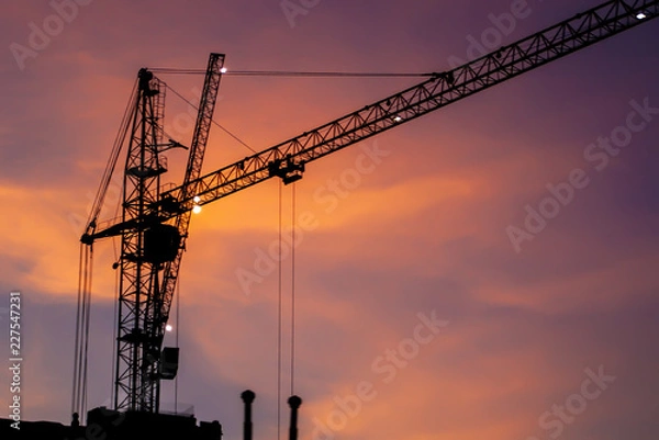 Obraz construction crane at sunset close-up