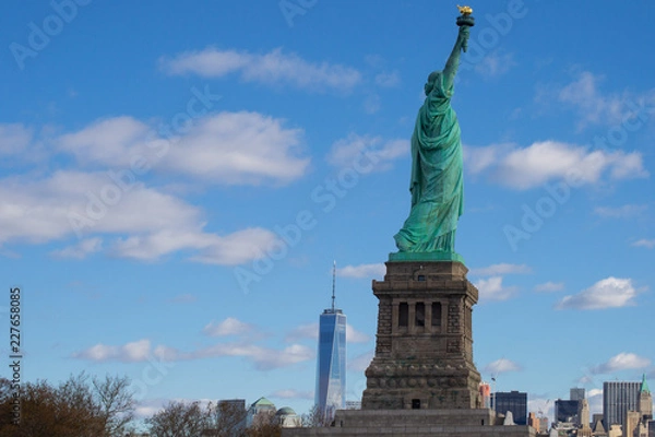 Fototapeta Statue of Liberty With One World Trade Center in Background