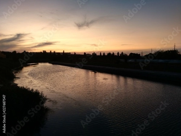 Fototapeta sunset on the river