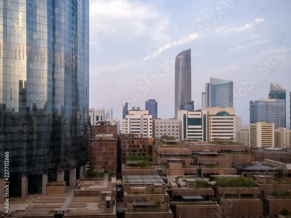 Fototapeta Shot of Abu Dhabi World Trade Center. The Mall and city Towers on a cloudy day