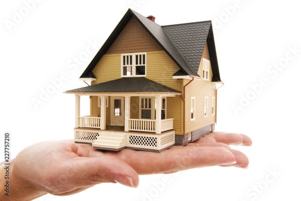 Obraz house in hand isolated on white