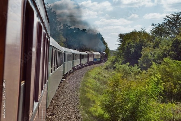 Fototapeta Train journey with steam locomotive