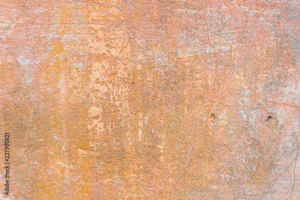 Fototapeta Wall fragment with scratches and cracks. It can be used as a background
