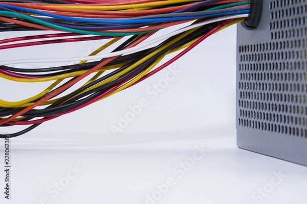 Fototapeta Multicolored computer cable isolated on white background
