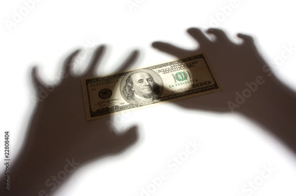 Obraz Hand shadow over money concept