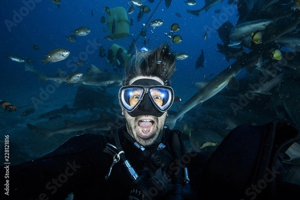 Fototapeta Pancking and Scared Scuba Diver Underwater with Mouth Wide Open