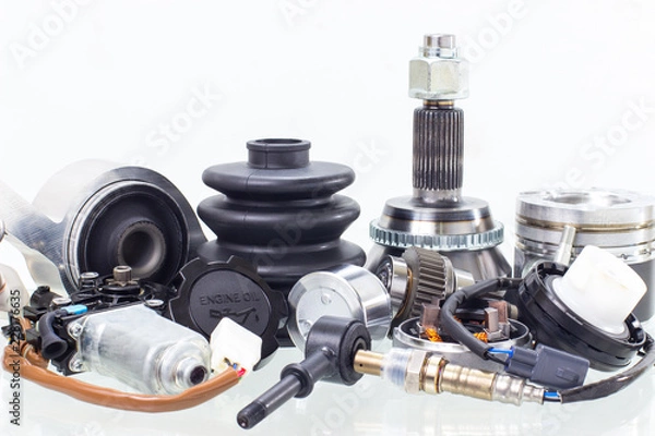 Fototapeta automobile engine parts isolated on white background. Auto shop
