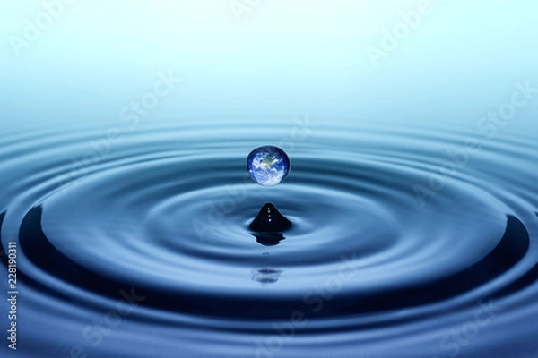 Obraz Falling drop of water with earth image