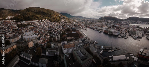 Obraz Aerial Drone Panorama View of Bergen City in Norway Scandinavia with Water, Bridges, and Mountains in distance