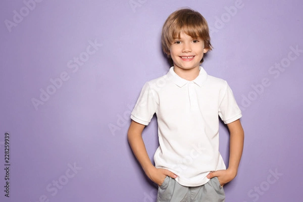 Obraz Little boy in t-shirt on color background