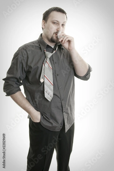 Obraz man smokes a cigarette