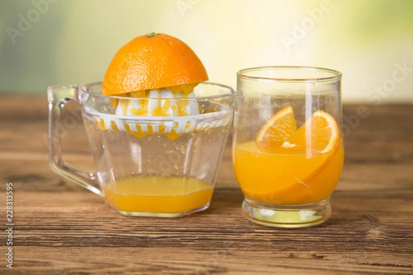 Obraz Natural orange juice, squeezer, oranges