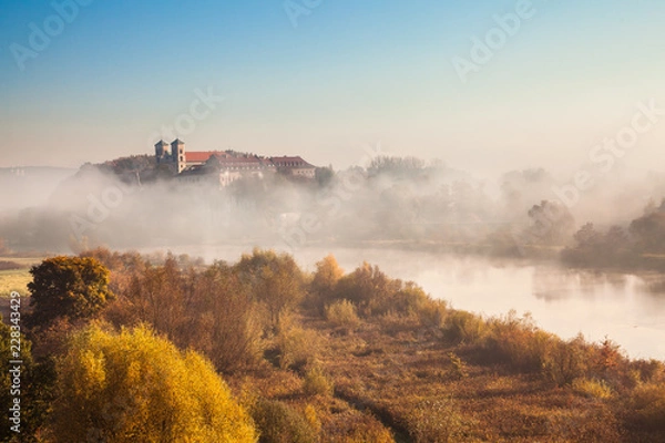 Obraz Abbey Tyniec surrounded by meandering Vistula river in colorful autumn scenery. Worth seeing nature reserve of Krakow