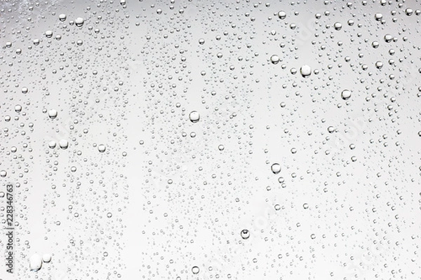 Fototapeta gray wet background / raindrops to overlay on the window, weather, background drops of water rain on the glass transparent