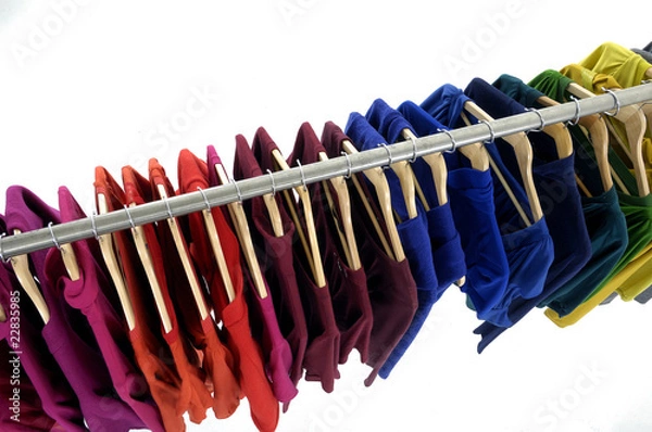 Obraz Top view colored Tee Shirts hanging