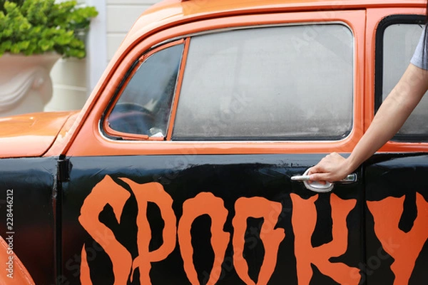 Obraz Hand with  car - Halloween Background