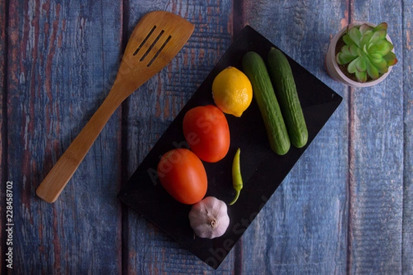 Obraz fresh vegetables on wooden table