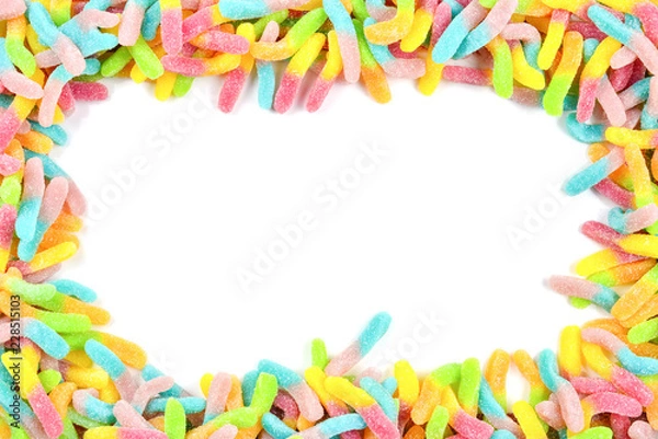 Obraz Frame of colorful gummy candies isolated on white. Top view. Space for text or design.