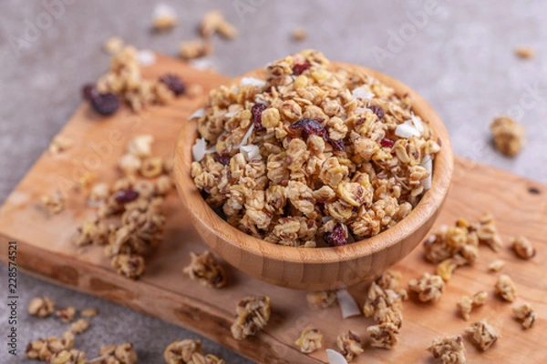 Fototapeta Bowl of homemade granola with nuts. Copy space