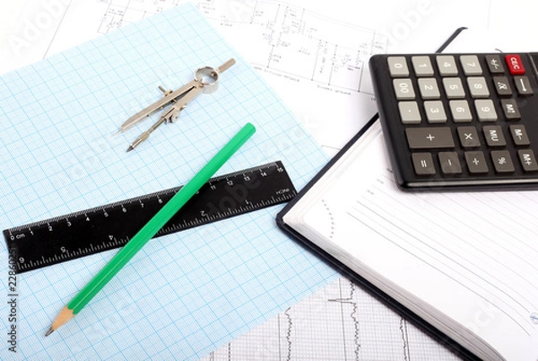 Fototapeta A compass on a graph paper