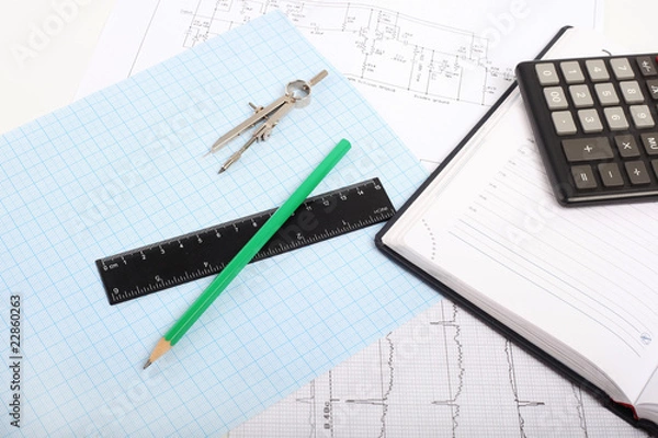 Fototapeta Compass on Graph Paper with notebook