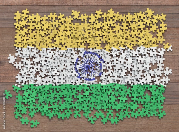 Fototapeta Flag of the India in disorganized pieces of a puzzle.