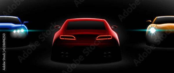 Fototapeta realistic red yellow blue three sport car view with unlocked headlights in the dark