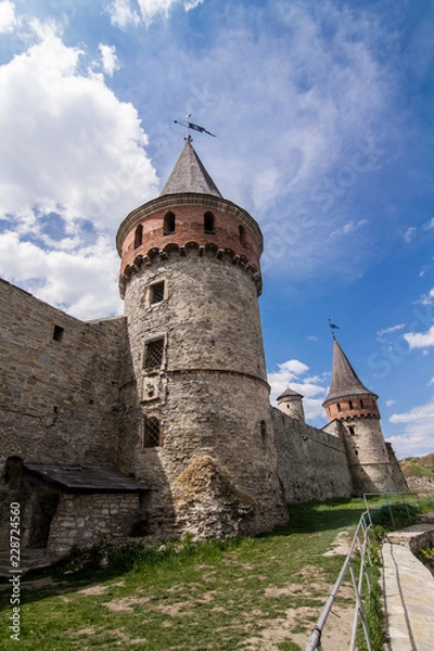 Fototapeta Tower of old castle in kamianets-podilskyi